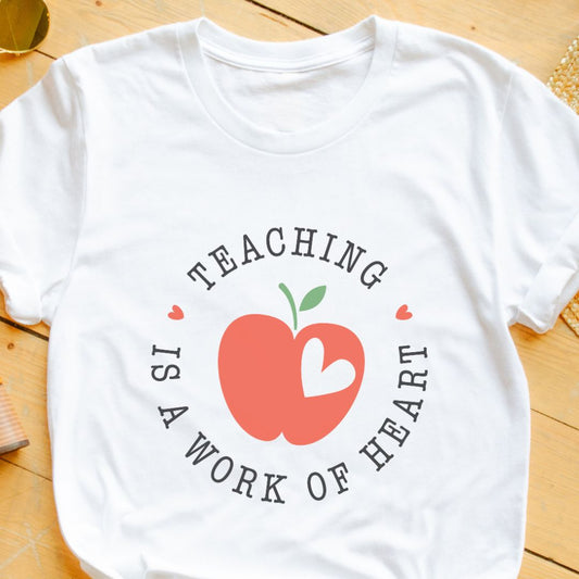 "Teacher is a Work of Heart" T-Shirt with Apple Design – Perfect for Early Childhood Educators | Unisex Fit