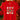 A bright red short-sleeve t-shirt hanging on a wooden hanger, featuring a central Christmas-themed graphic print with a mug, bows, a deer, a tree, a Santa face, and a snowman. The background is a warm, festive holiday scene with blurred Christmas lights and a tree.
