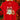 A red short-sleeve crewneck t-shirt hanging on a wooden hanger, featuring a festive Christmas graphic with a gingerbread cookie, a decorated tree, and a red bow. The background shows a blurred Christmas tree with warm lights.